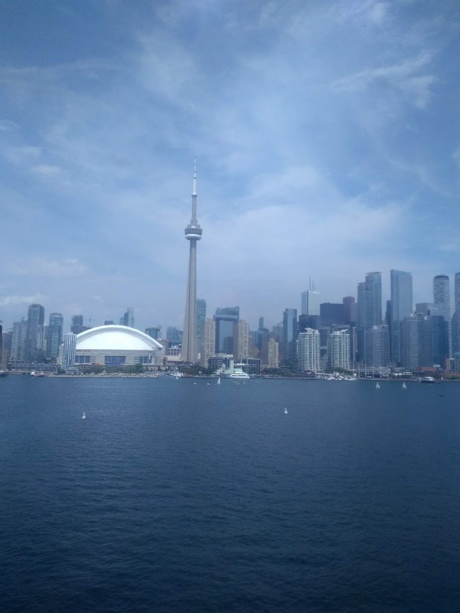 Picture: The Toronto, Canada skyline. The dome-shaped building is where the Toronto Blue Jays play their home games; the tower in the middle is the CN Tower. 