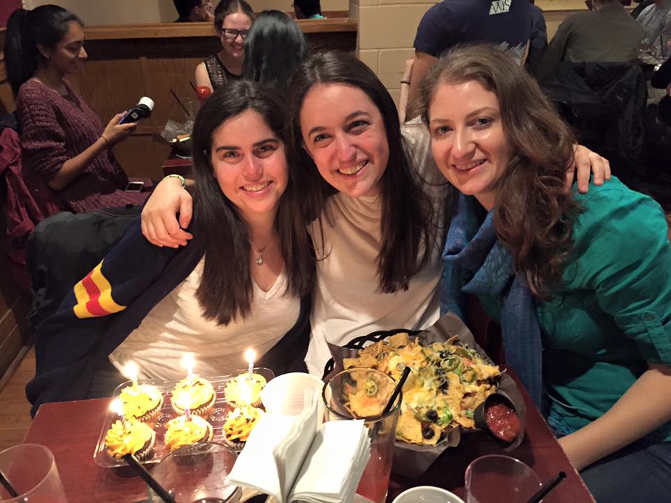 Picture: Carli and two friends enjoying an evening at their undergraduate institution’s student-run campus pub.