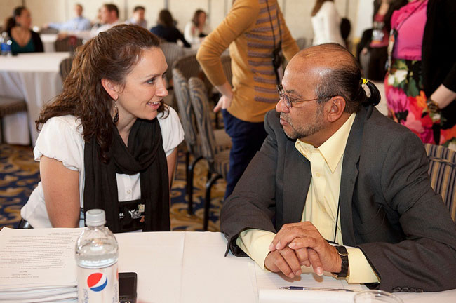 Two Convention Attendees in Conversation